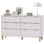 Commode double 6 tiroirs avec façades cannelées, poignées dorées et cinq pieds en bois, blanche, 54W